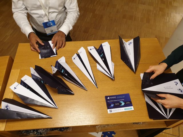 Visitors building planes-- the promotional materials, in the PARSEC zone during European Space Week 2019 